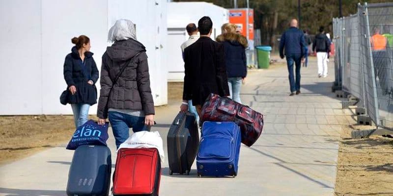 Refugiados con maletas